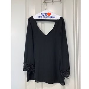 Long Sleeve Low Cut Black Dress with Lace Trim